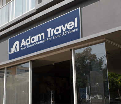adam travel agency phone number